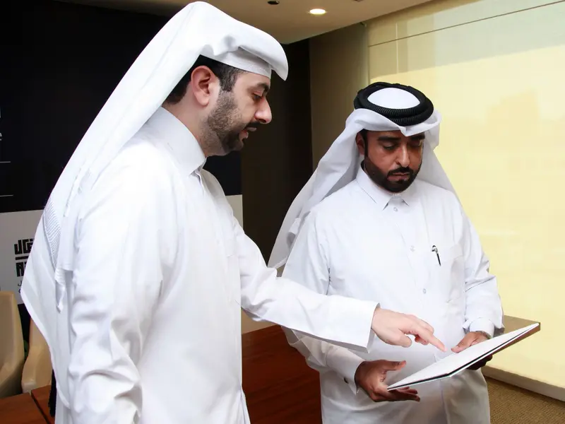 Delegates in conversation at the conference, 2024.