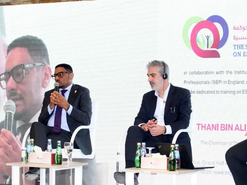 A panel of speakers seated on the conference stage, 2025.
