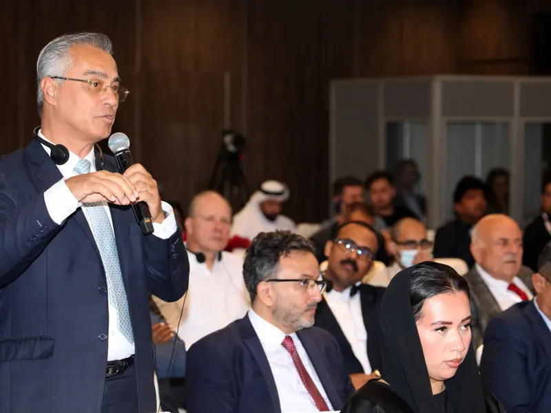 A speaker addressing the conference, 2025.