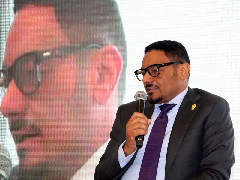 A speaker addressing the conference, 2025.