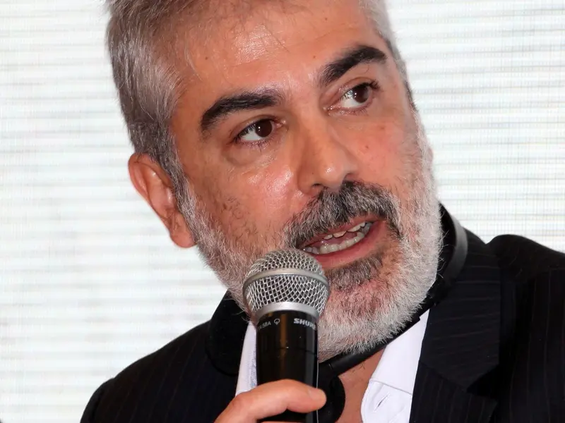 A speaker addressing the conference, 2025.