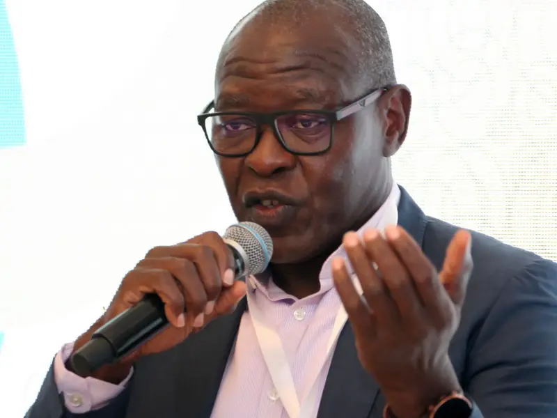 A speaker addressing the conference, 2025.