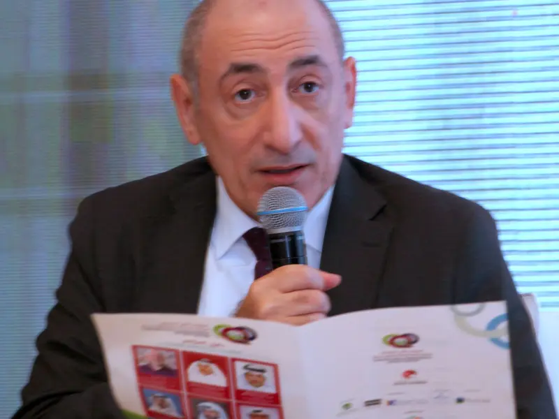 A speaker addressing the conference, 2025.