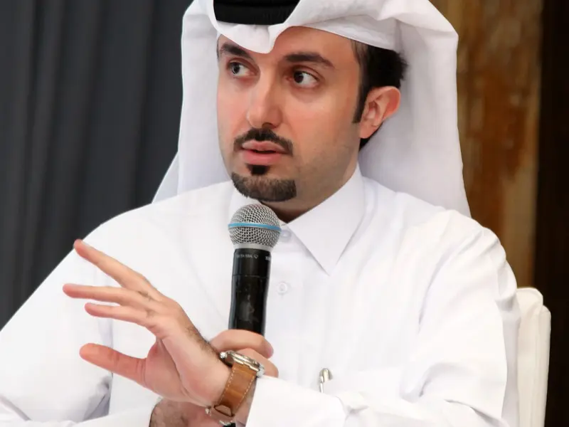A speaker addressing the conference, 2025.