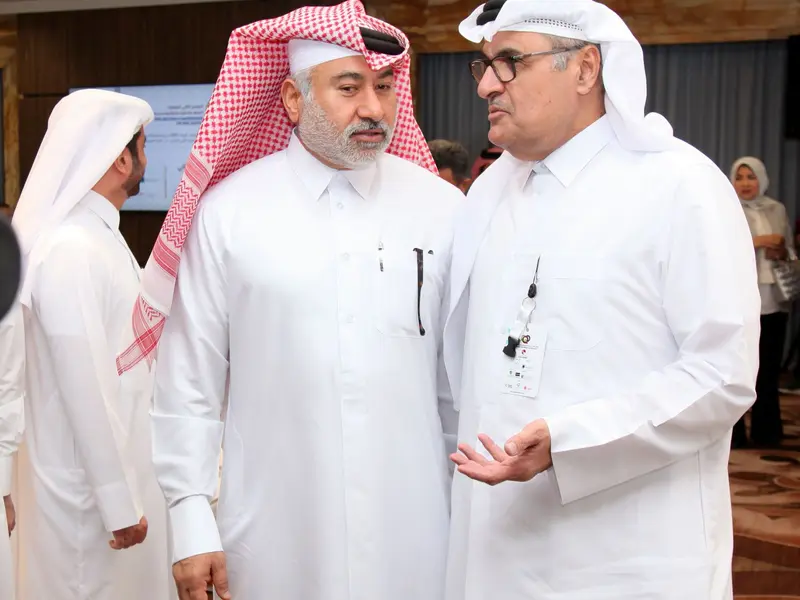 Delegates in conversation at the conference, 2025.
