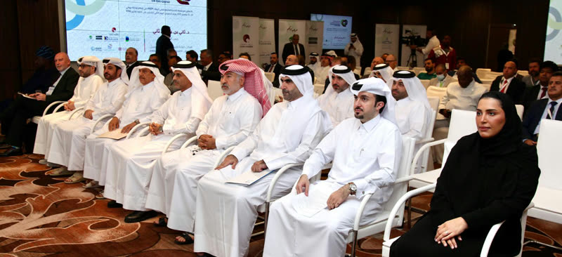Front rows of dignitaries seated at the Second Conference on ESG Qatar 2025, the event title slide projected on the main screen behind them.